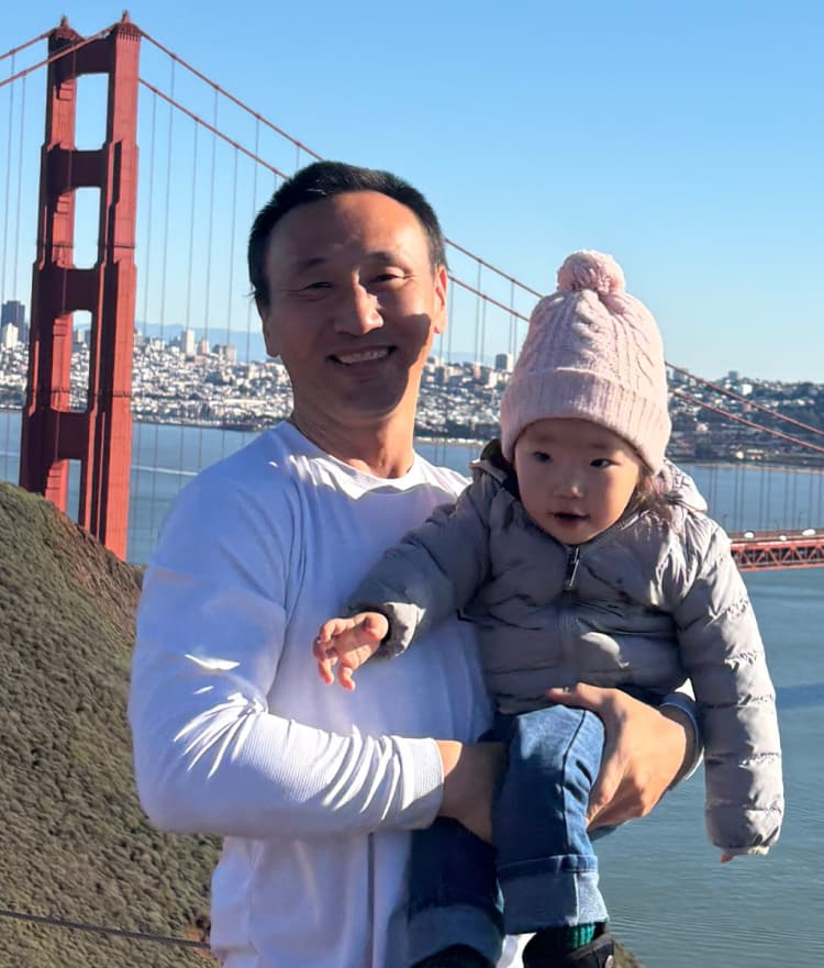 Tim with his family in a warm family moment